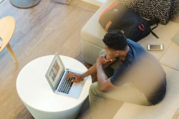 Student works on a laptop 