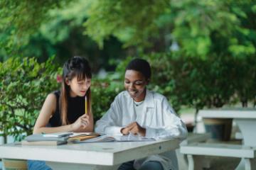 Students sitting outdoors 