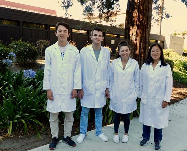 Grace Stokes with student researchers