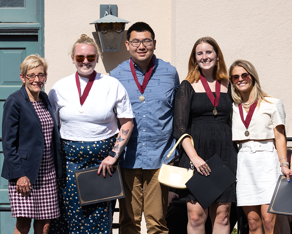 SCU President Julie Sullivan and Class of 2023 Student Life Award winners Hannah Edwards, Kevin Ham, Anna Murrin, Ariel Perlman