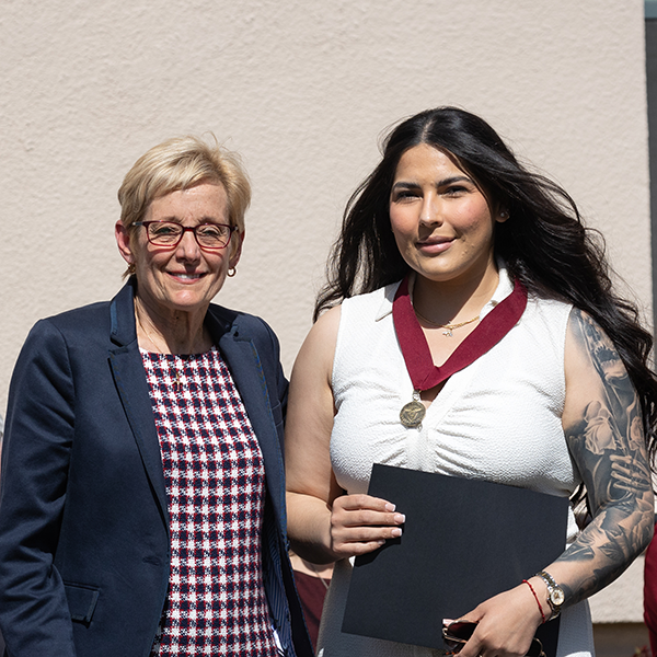 SCU President Julie Sullivan and Class of 2023 Peter-Hans Kolvenbach, S.J. Award winner Jessica Cuellar