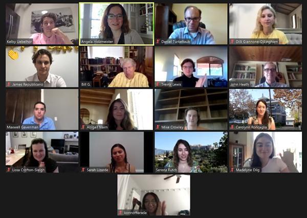 People in a video conference grid as part of an initiation event.