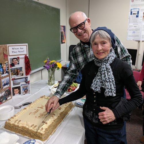 Geoff and Josie Fox cutting cake