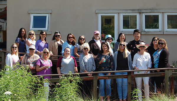 CAS department managers in the Forge Garden for the end of year celebration.