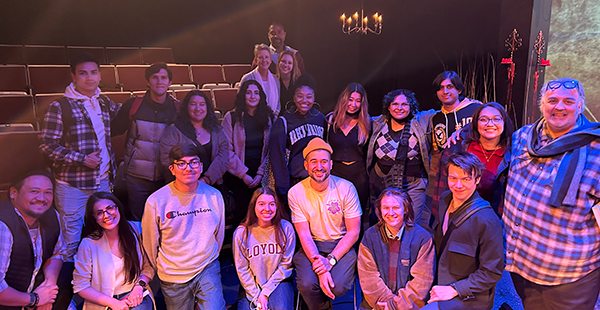 SCU faculty and students with members of The Travelers: Brian Rivera, far left; Juan Amador, wearing orange cap; and Luis Alfaro, far right.