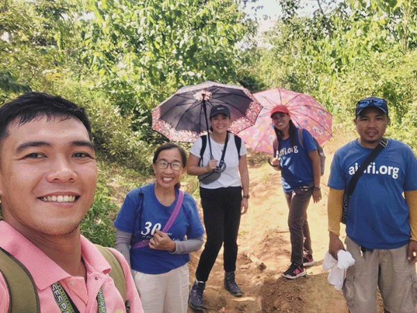 Chan Thai with collaborators at AIDFI on the island of Negros in the Philippines