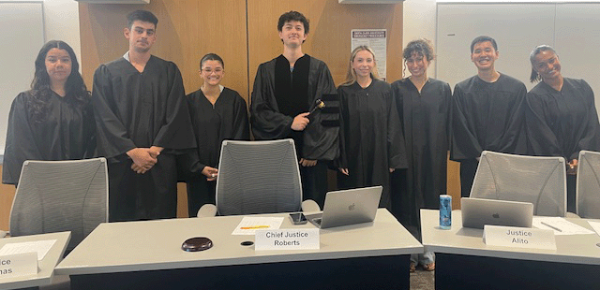 (L-R): Karina Gutierrez '26 (Political Science, Spanish Studies), Jonathan Blanco '25 (Political Science), Isabella Espinoza '24 (Political Science), Robert Duoto '25 (Political Science), Athena Sanchez Erb (Political Science), Sydney Maccabe '26 (Political Science), Brad Zukeran '24 (Environmental Science), and Ria Punukollu '26 (Political Science).