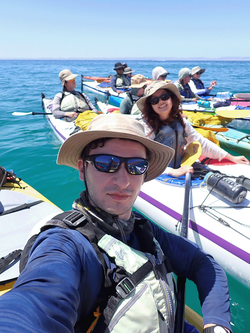 Max Johnston '24 and fellow Bajarinos, including Stephanie Davis '25, kayaking in the Sea of Cortez