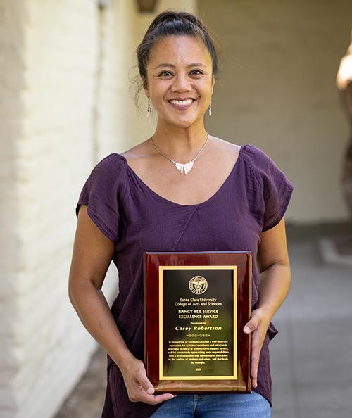 Casey Robertson with her award