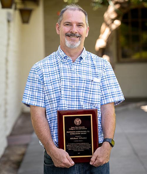 Michael Whalen with his award