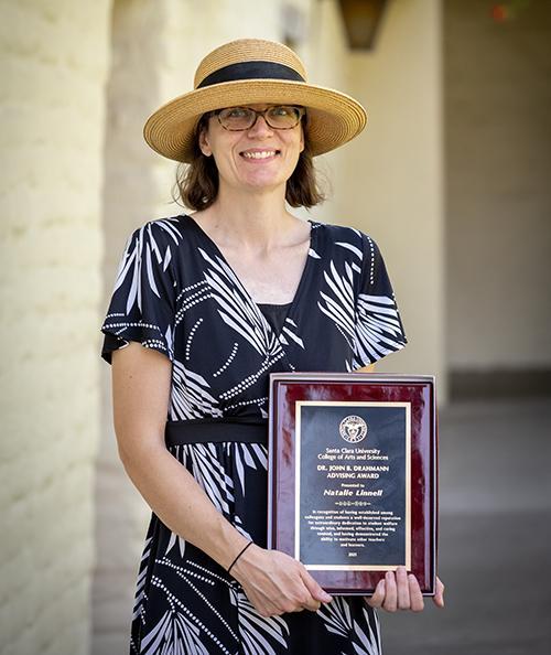 Natalie Linnell with her award