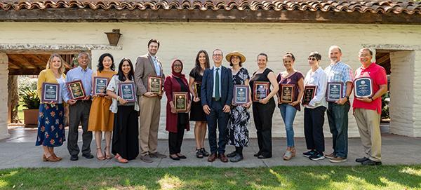 Group picture of all the 2021 award winners and Daniel Press