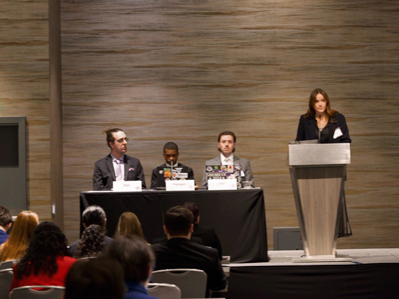 Leah Jannetti presenting her committee’s final report at the Closing Plenary Session of the General Assembly.