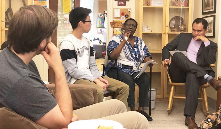 Teresia Hinga and Roberto Mata with students.