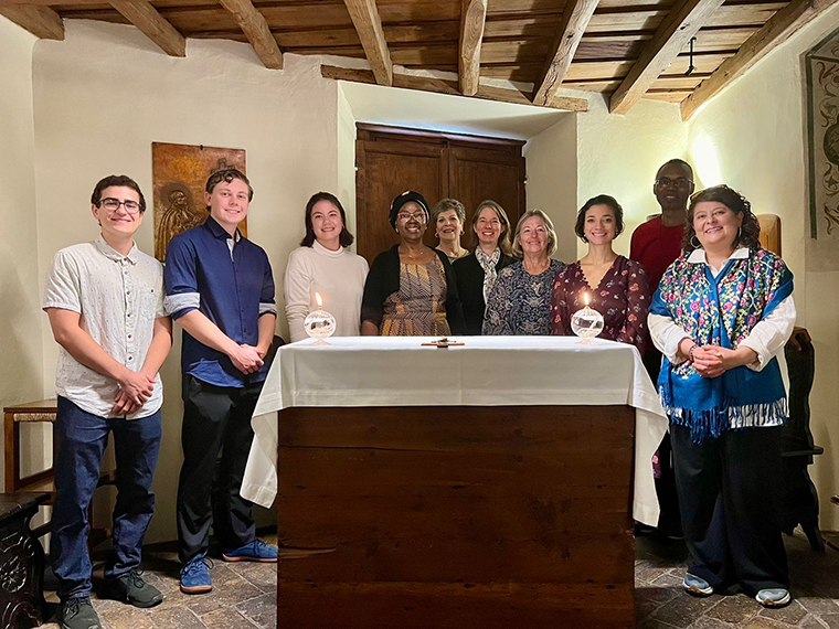 Group photo inside a chapel.