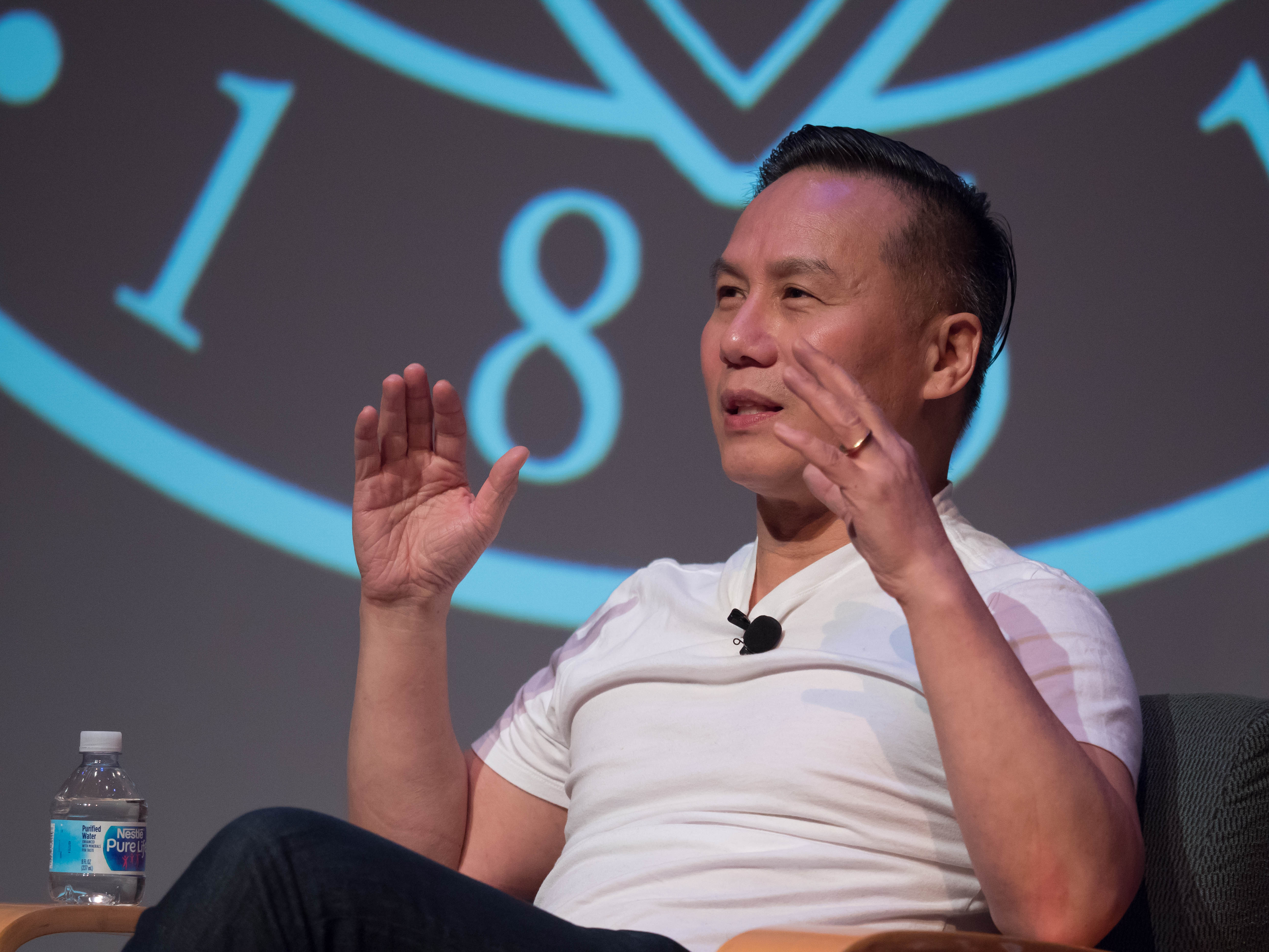 A person speaking at an AAPI event with 