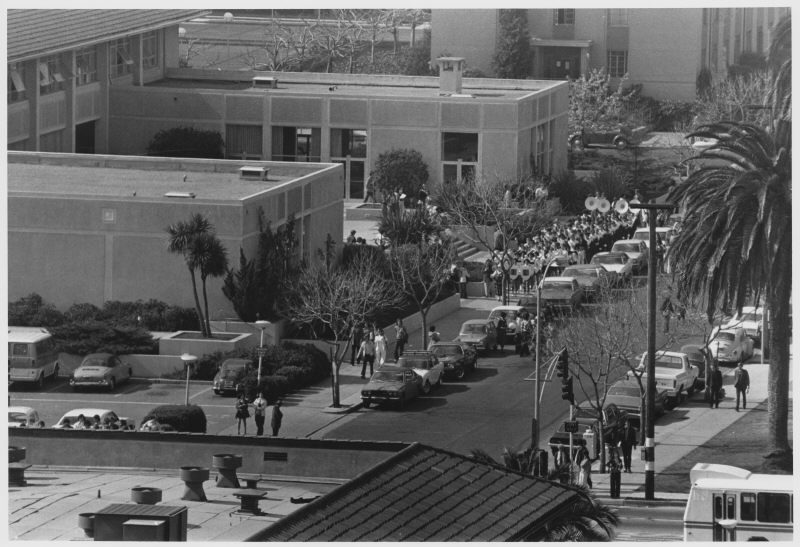 “Marching Band on The Alameda at Market Street by Benson Center, ca. 1975” by William C. Eymann