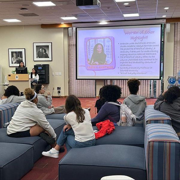 Students attend a lecture on the musical cultures of Brazil and the U.S.