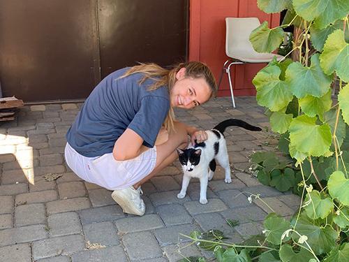 Madison Hoffman with a cat