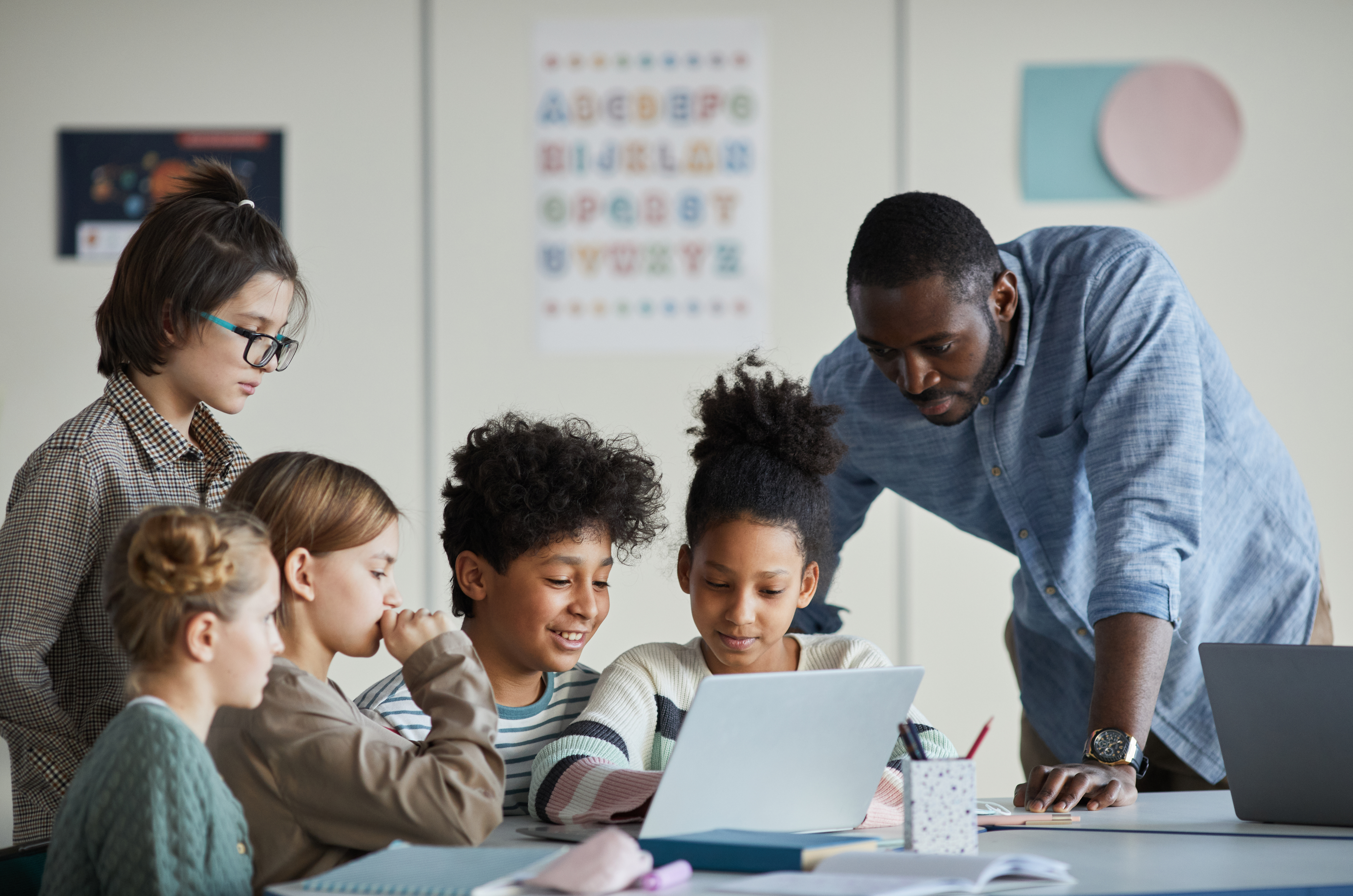 Teacher in classroom with students