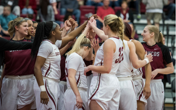 Basketball huddle (photo by Joanne Lee)