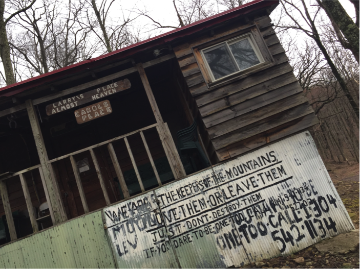 Bullet holes can still be seen on the surface of Larry’s trailer home situated in Stanley Heirs Park. Later he moved into a cabin, upon which words read “Love Them or Leave Them Just Don’t Destroy Them” [6]