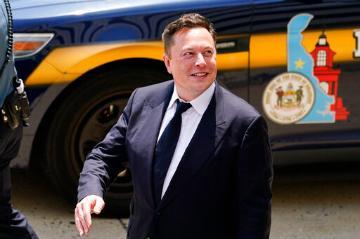 Tesla CEO Elon Musk departs from the justice center in Wilmington, Del., Tuesday, July 13, 2021. Matt Rourke/AP Photo