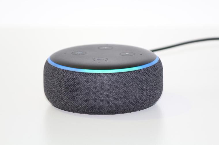 A blue and gray Amazon Echodot.