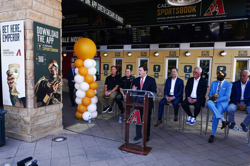 Arizona Republican Gov. Doug Ducey speaks at a news conference as the Arizona Diamondbacks partner with Caesars Entertainment setting up temporary betting windows at the Diamondbacks' Chase Field, Thursday, Sept. 9, 2021, in Phoenix. Ross D. Franklin/Associated Press