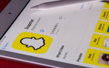 Alt text: Snapchat app open on a tablet showing the app's interface.