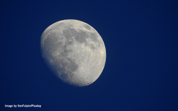 The moon in a night sky.