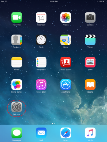 Screenshot of iPad home screen with various app icons.