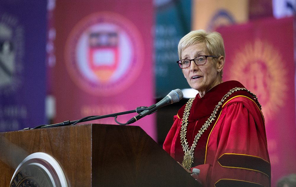 Julie Sullivan speaks at podium at Inauguration