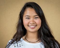 Smiling person against a plain background, titled 'Rachael Han Johnson Scholar.'