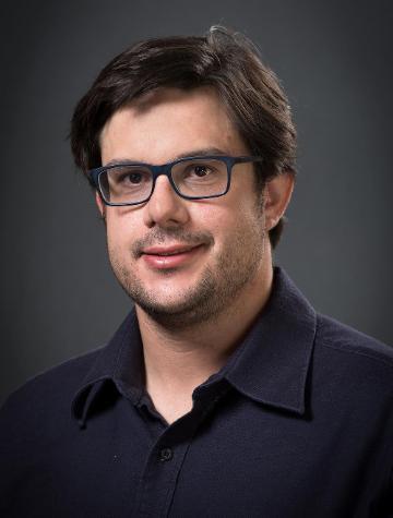 Assistant Professor of Economics Christian Helmers Head Shot