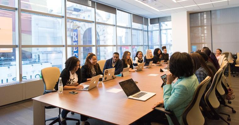 Board members sitting around a conference table