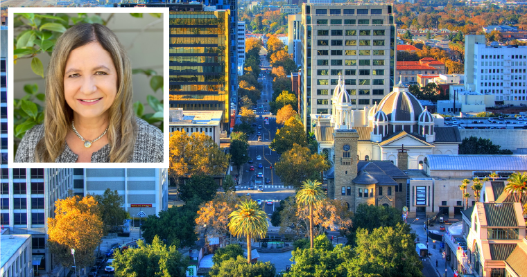 Jennifer Maguire headshot over a photo of the city of San José