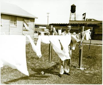 Hanging clothing to dry outside SCU student-veteran housing accomodations