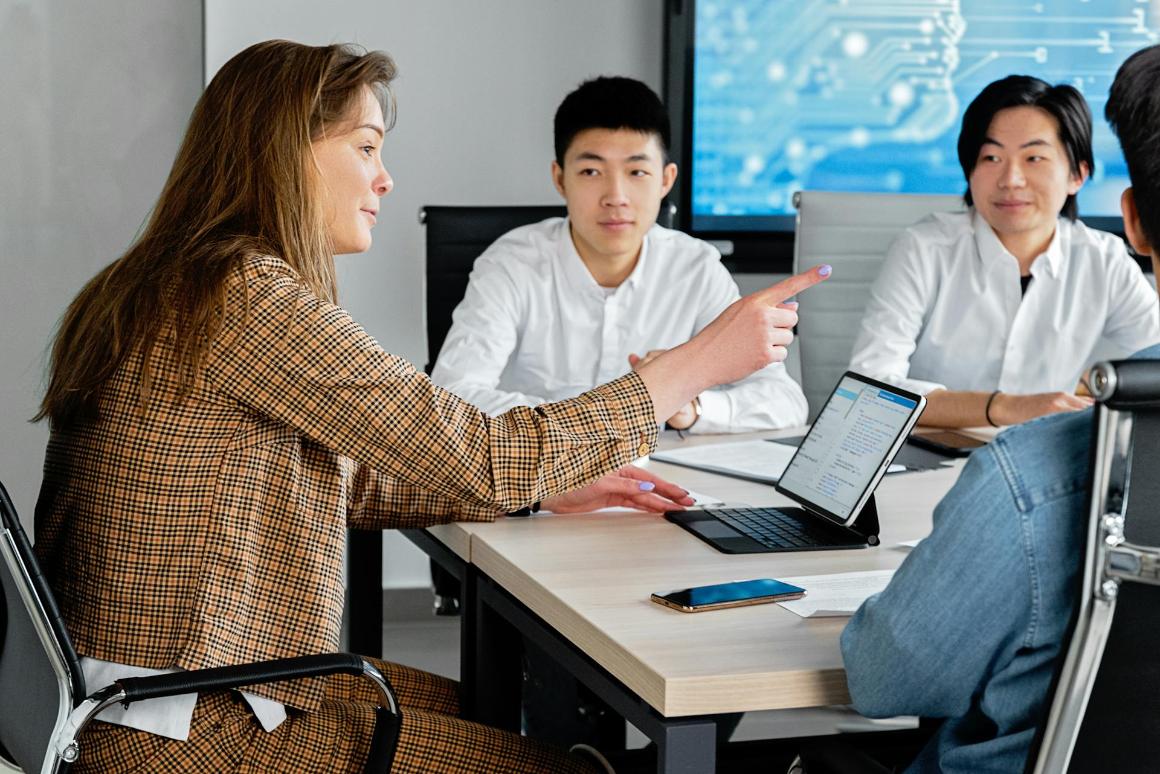Leader delegating work to team members