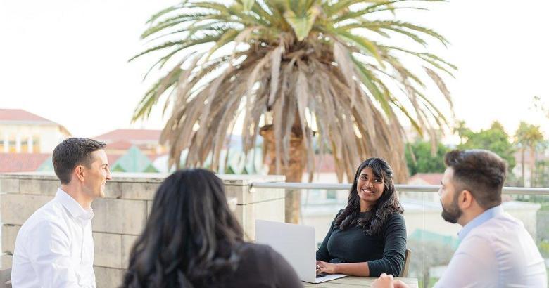 Students sitting on Lucas Hall terrace