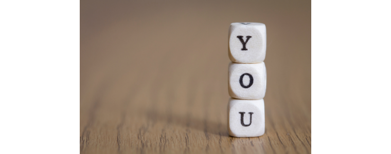 Lettered dice with the word you spelled out