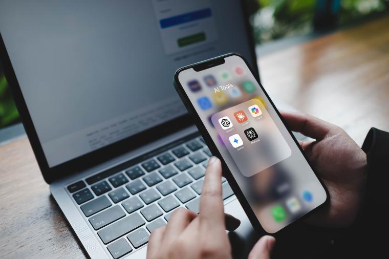 Stock image of phone with apps for AI tools 