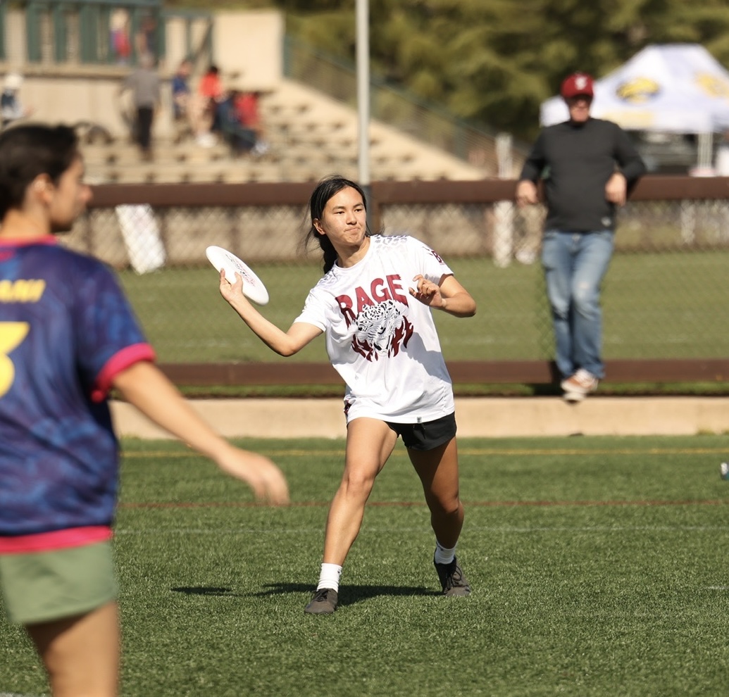 One of WLT captains playing frisbee