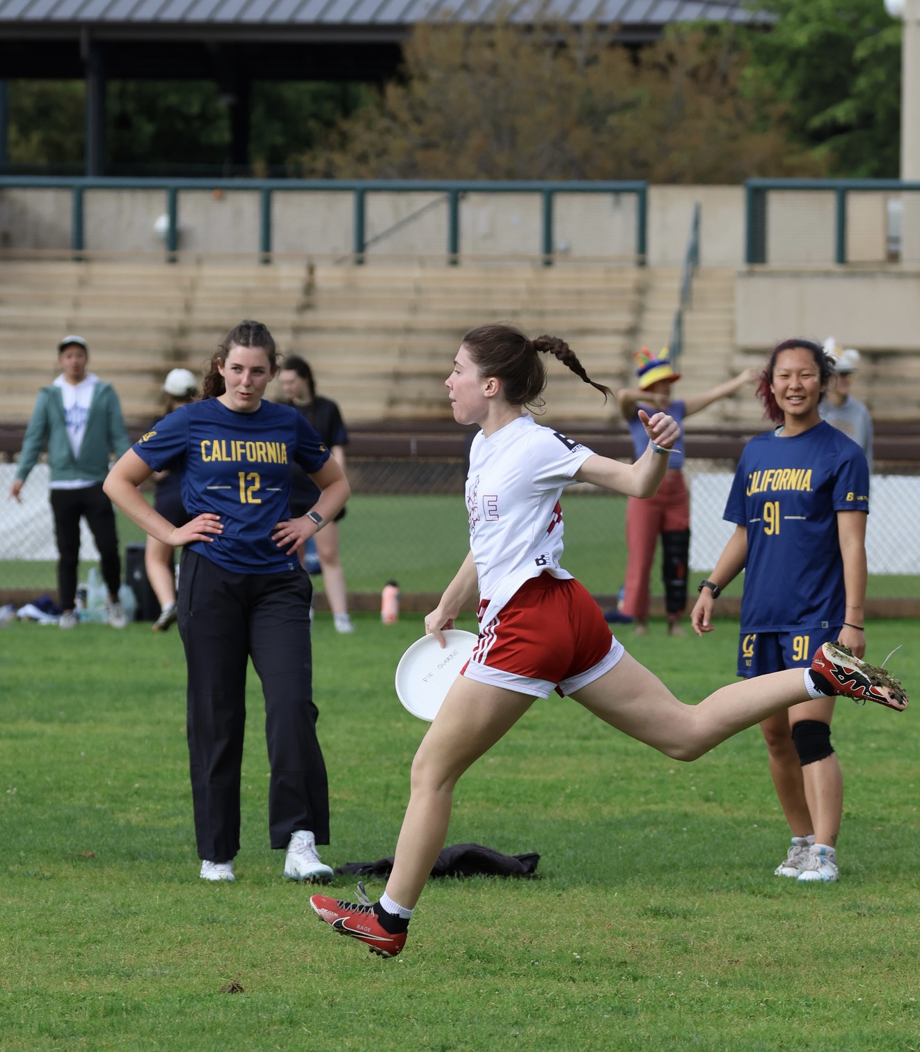 One of WLT presidents playing frisbee