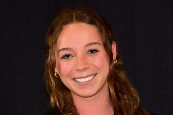 A photo of Andréa Georgenes smiling. 