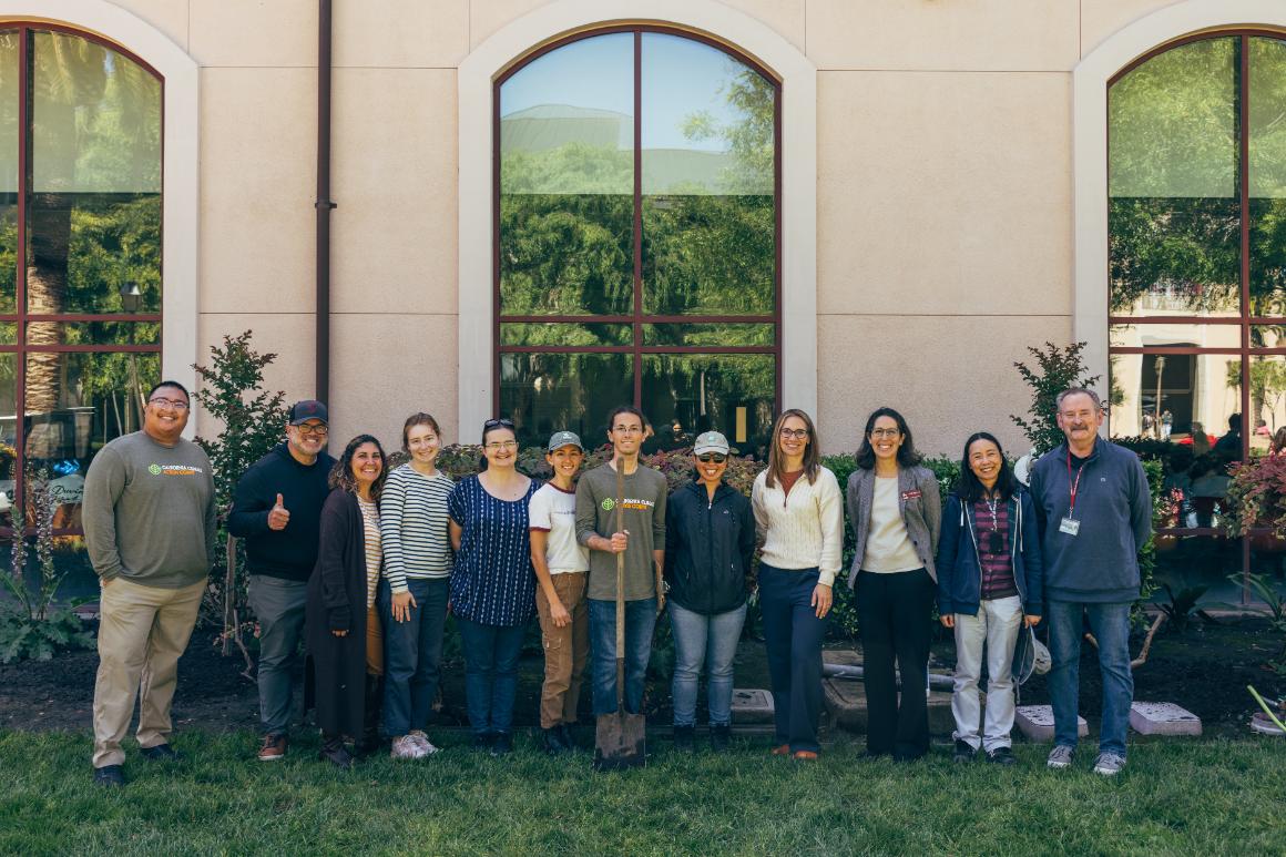 Arbor Day 2026: Group standing in front of recently planting trees in front of Graham image link to article
