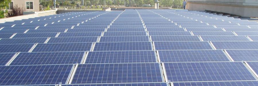 Rows of bright solar panels on a roof