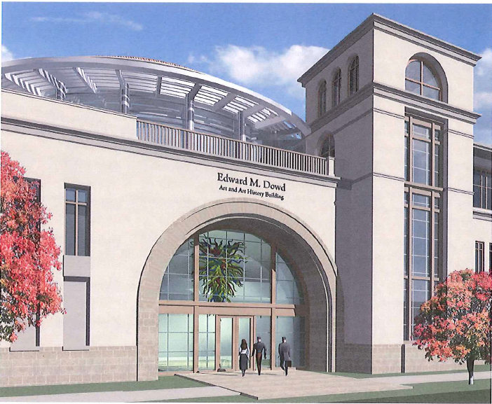 Alt text: Modern building entrance with large archway and glass doors. image link to story