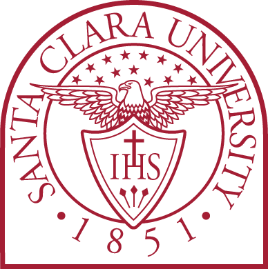 University seal featuring a winged emblem and the letters IHS