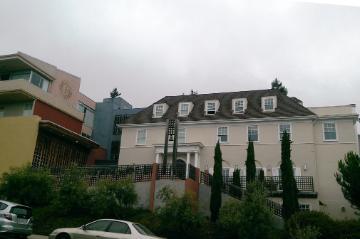 Large house with trees located at 1735 LeRoy Avenue.